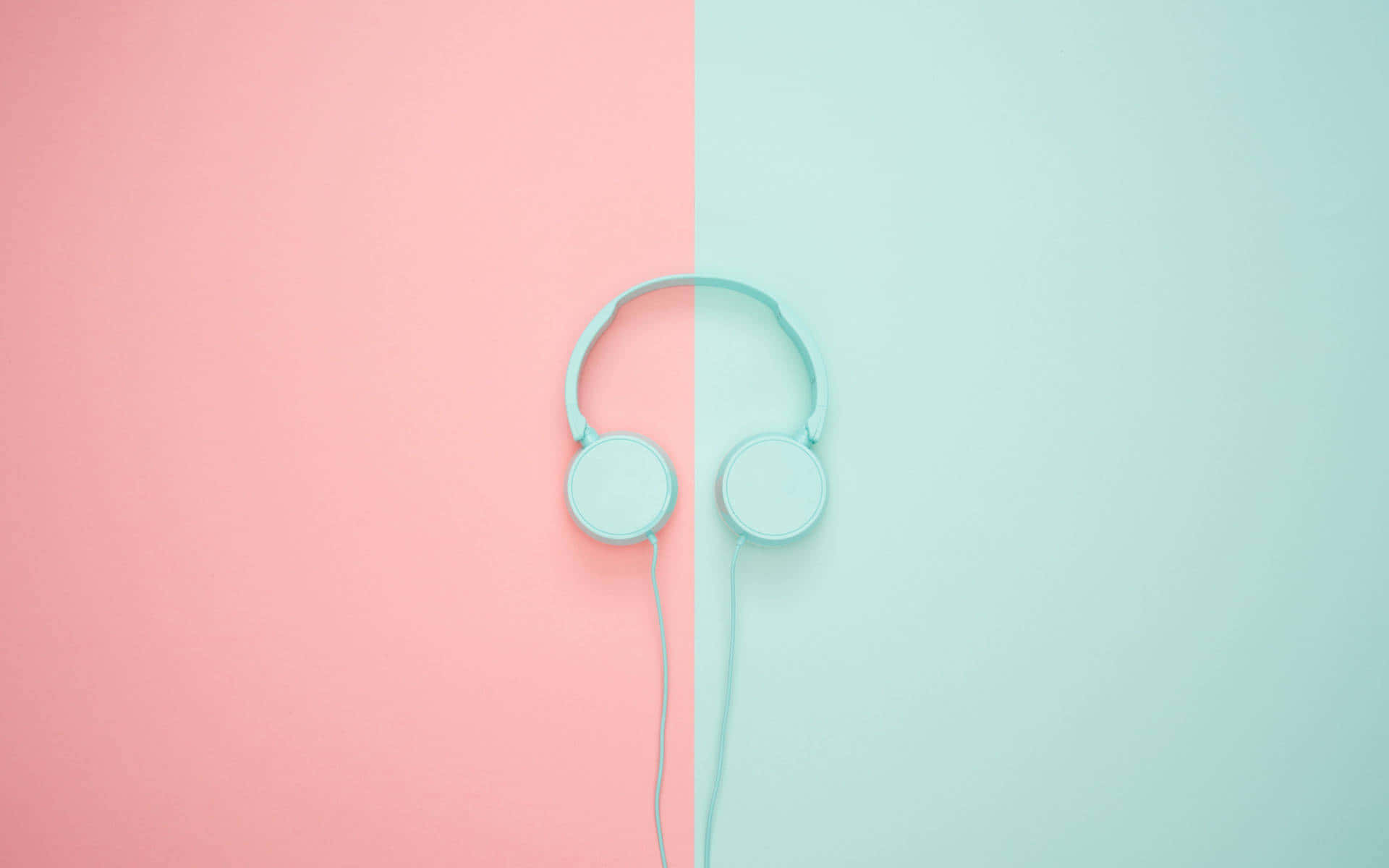 Hovedtelefoner på en pink og blå baggrund Wallpaper