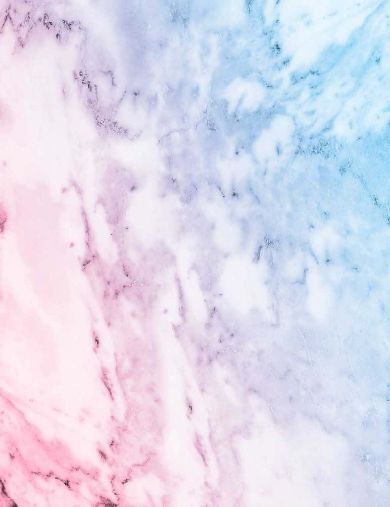 Bløde pastel nuancer af blå og pink støder sammen for at skabe en beroligende abstrakt tapet. Wallpaper
