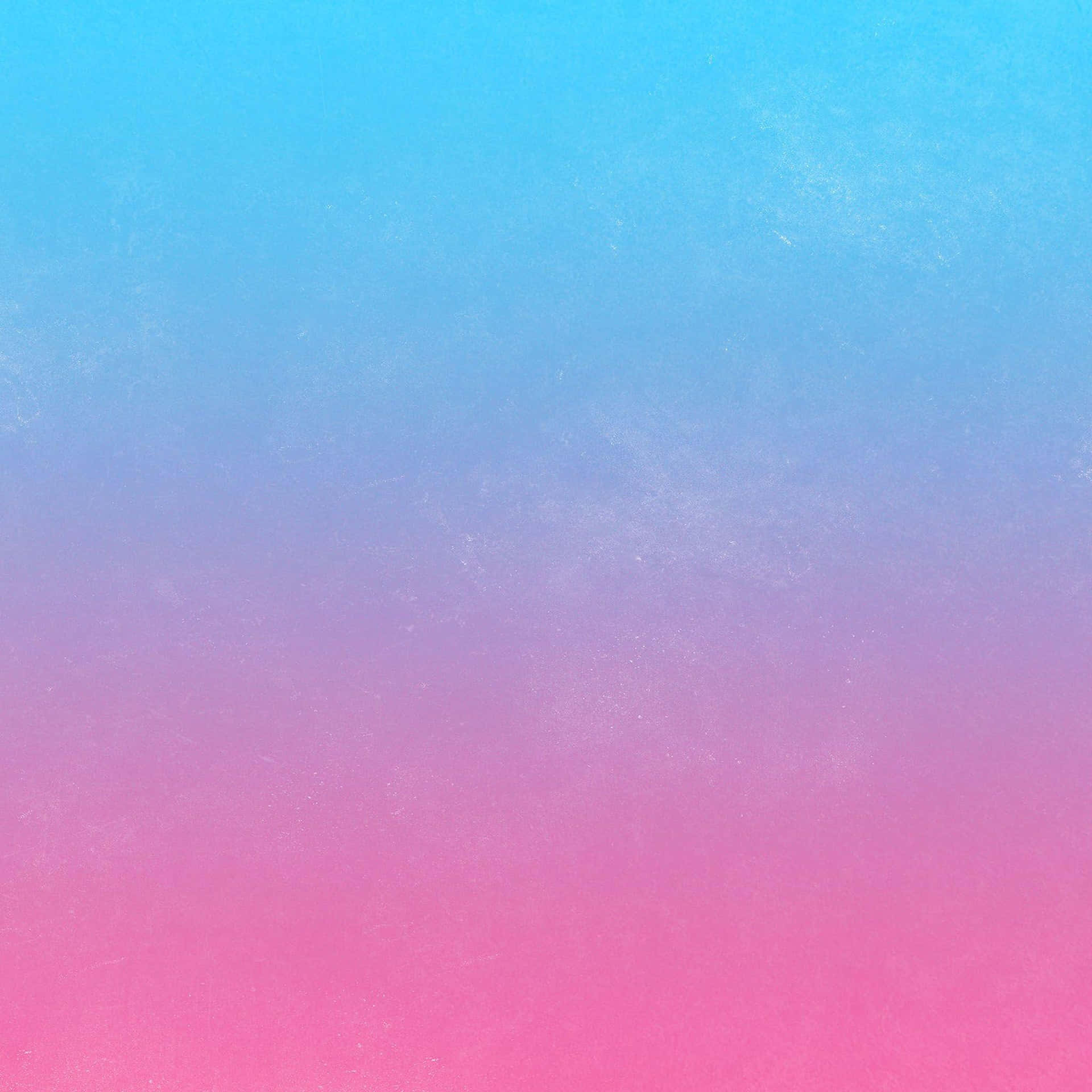 Blød, drømmende pastelfarvet blå og pink tapet med fluffy skyer. Wallpaper