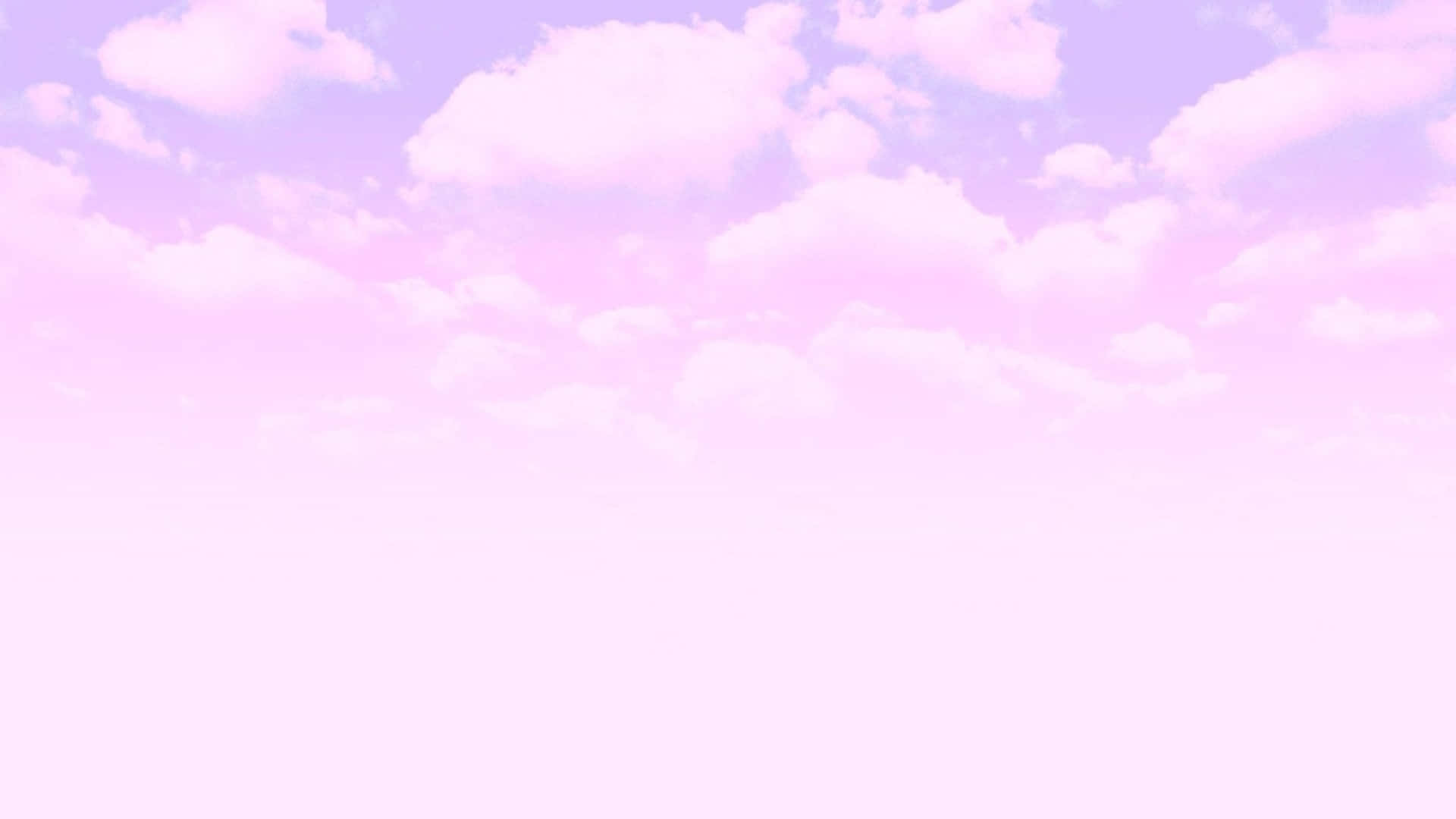 A Pink And Purple Sky With Clouds