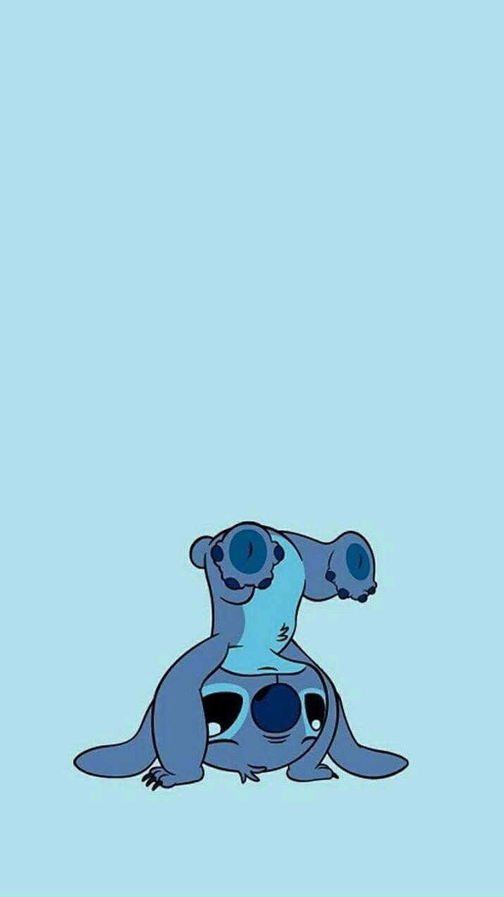 A Blue Cartoon Character With Big Eyes Wallpaper