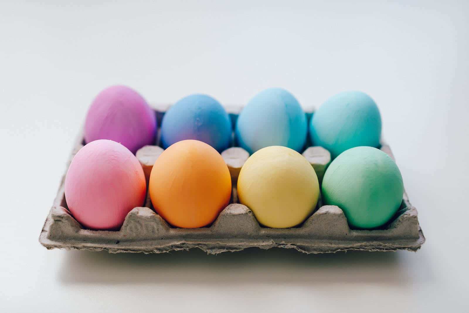 Colorful Easter Eggs In A Cardboard Box Wallpaper