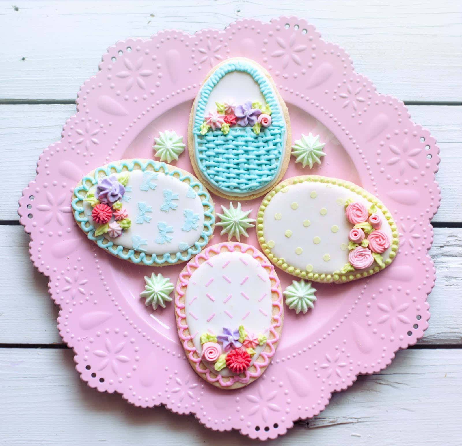 Four Cookies Decorated With Flowers And A Basket Wallpaper
