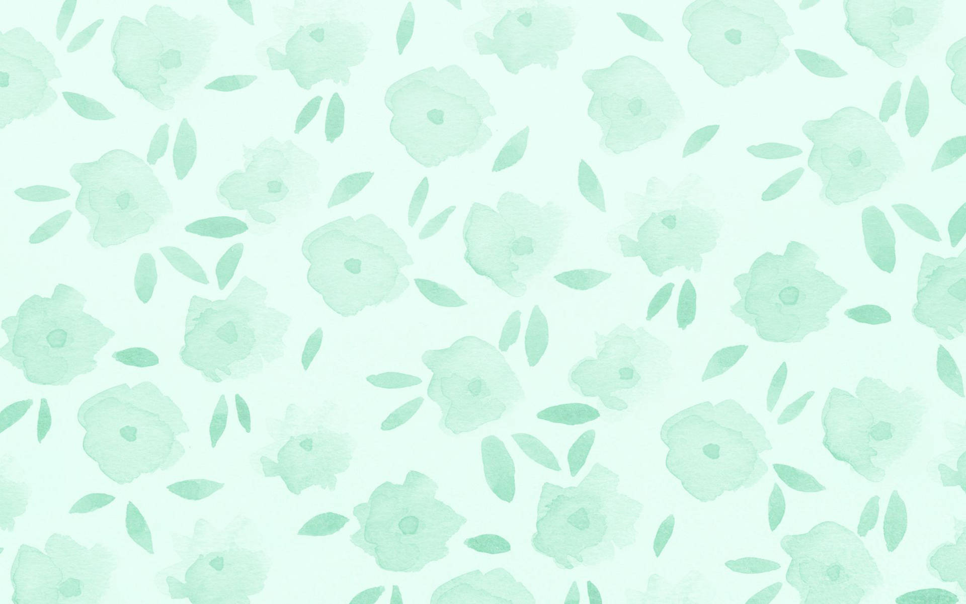 A chic, pastel green laptop perfect for those looking to add some aesthetic flair to their work or study space. Wallpaper