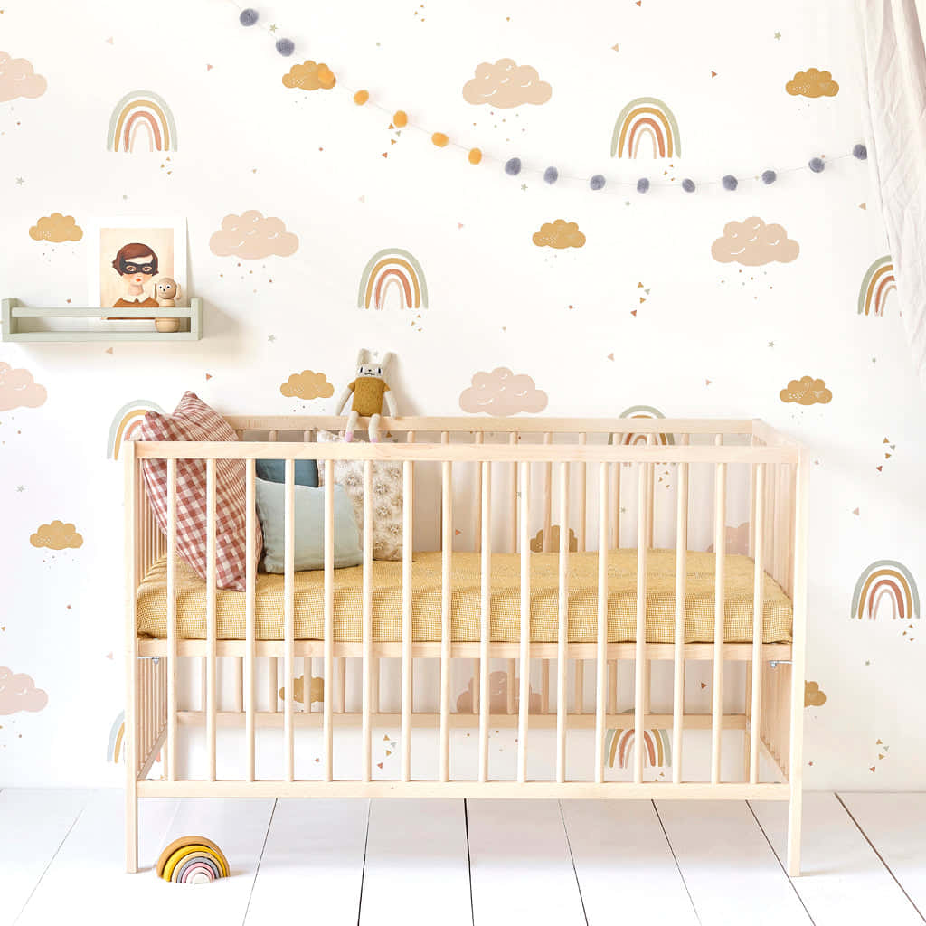 Pastel Nursery Roomwith Crib Wallpaper