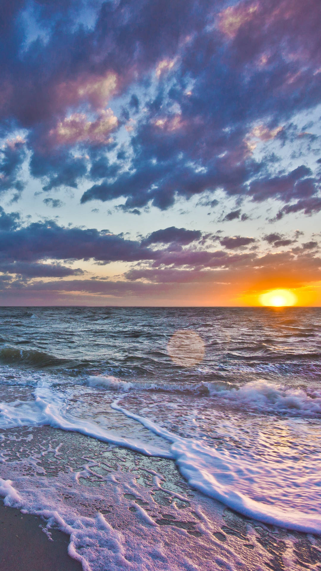 Pastelltelefonen,solnedgång Och Havet. Wallpaper
