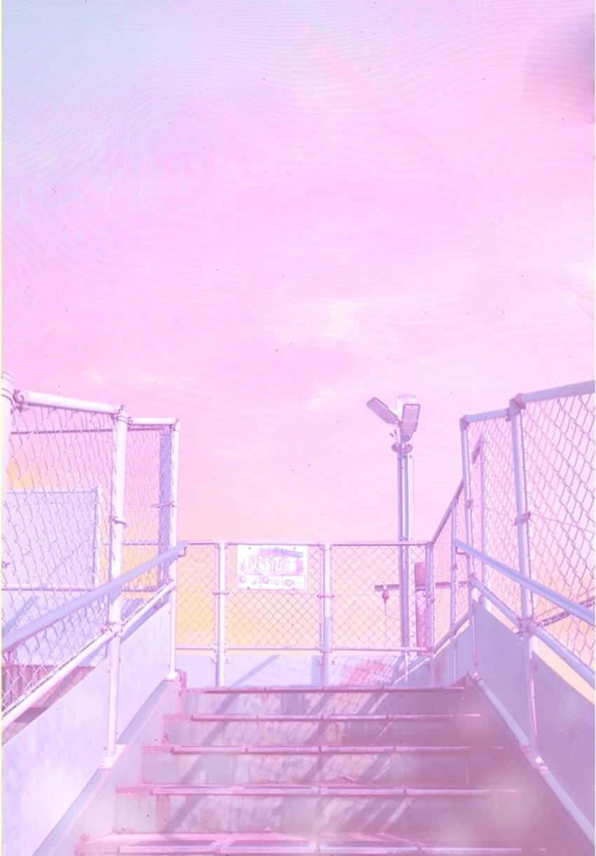 En pink himmel med trapper, der fører op til et bygning Wallpaper