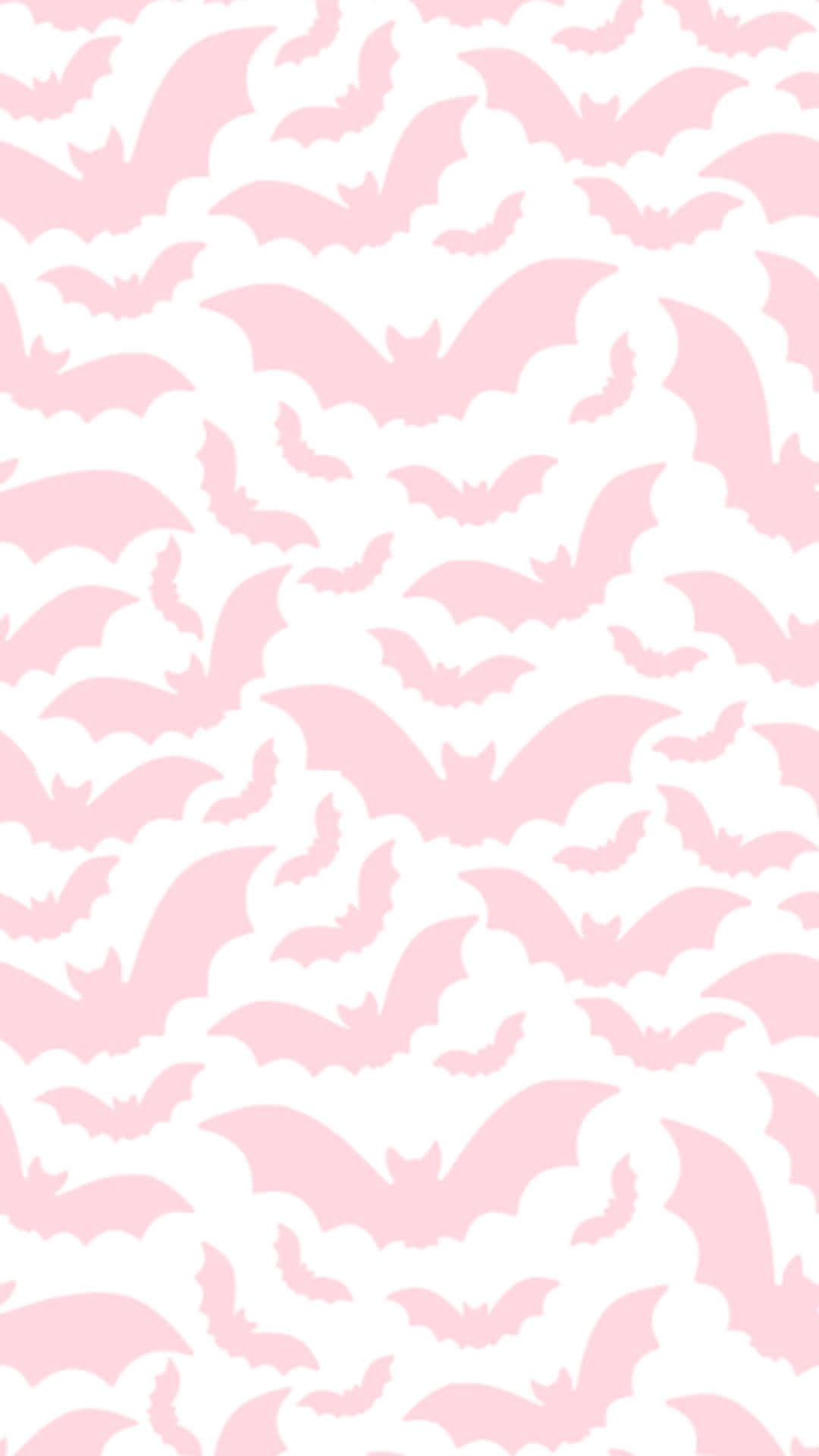 Pastel Pink Bat Pattern Halloween Wallpaper