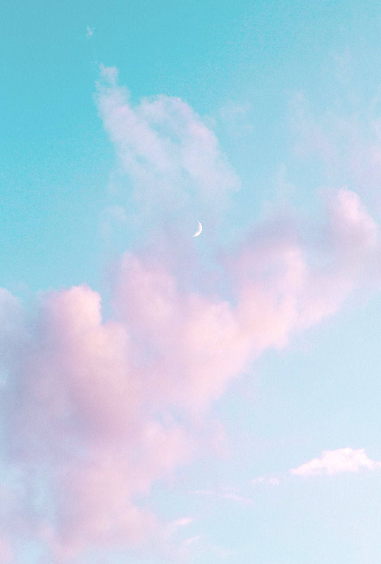 Pastel Pink Clouds And Luna Wallpaper