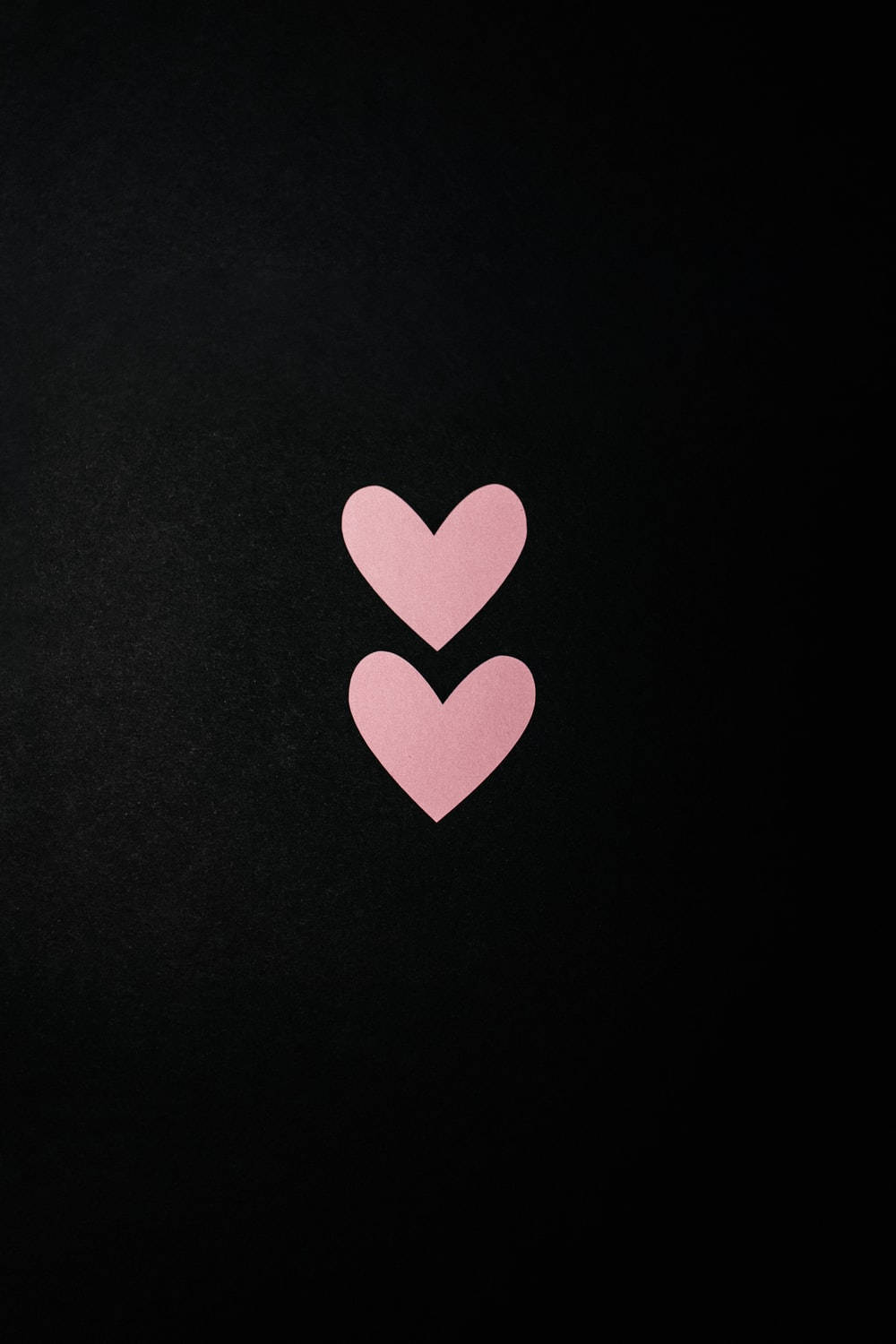 Pastel Pink Heart In Black Background Wallpaper