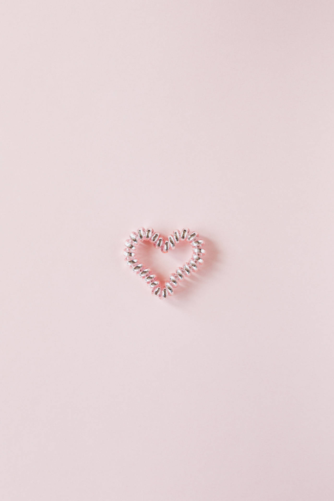 Pastel Pink Heart Spiral Hair Tie Wallpaper