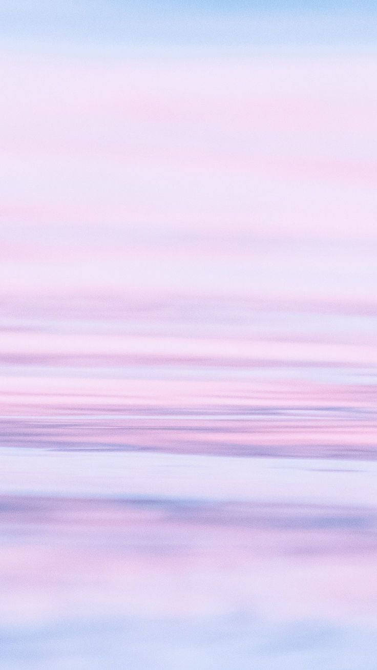 Brighten up your space with this Pastel Pink Iphone Wallpaper