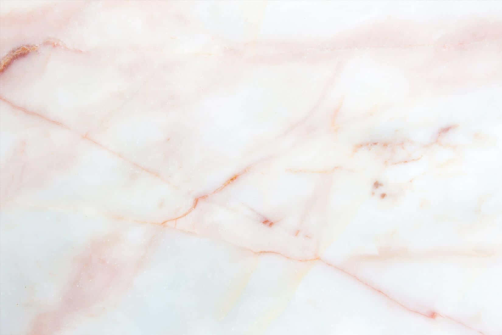A Close Up Of A Pink Marble Surface Wallpaper