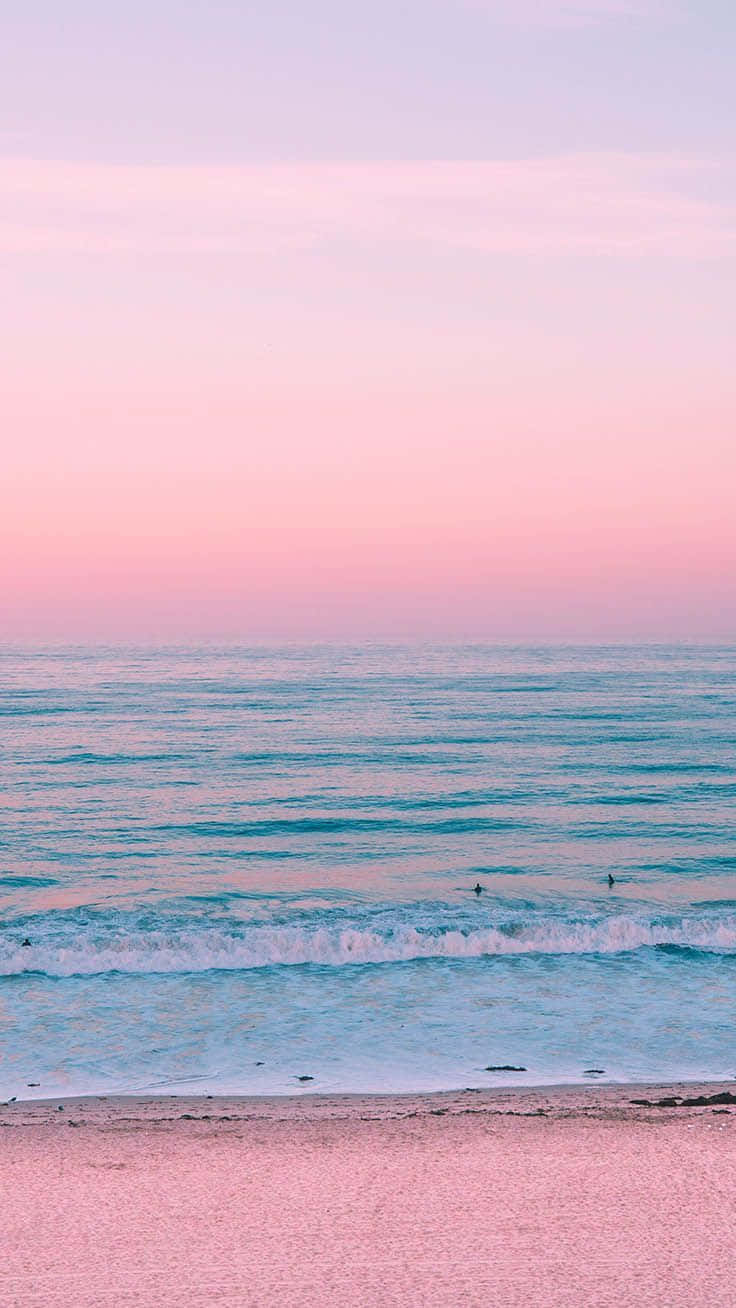 Pastel Sunset Beach Surfers Wallpaper