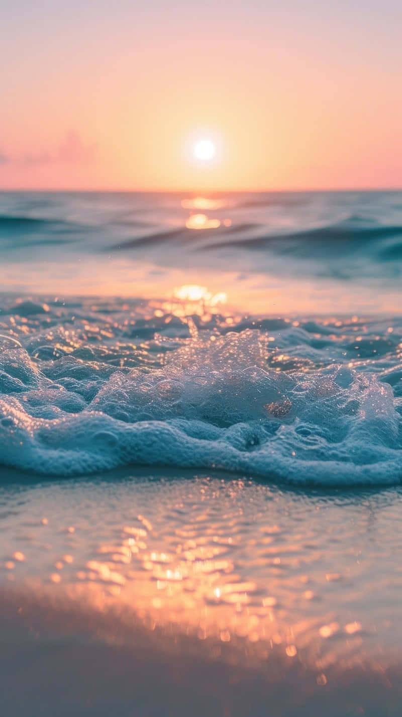 Pastel Sunset Beach Waves Wallpaper