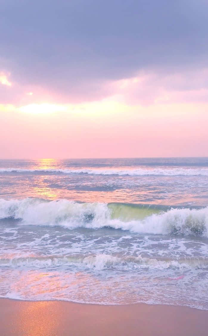 Pastel Sunset Beach Waves Wallpaper
