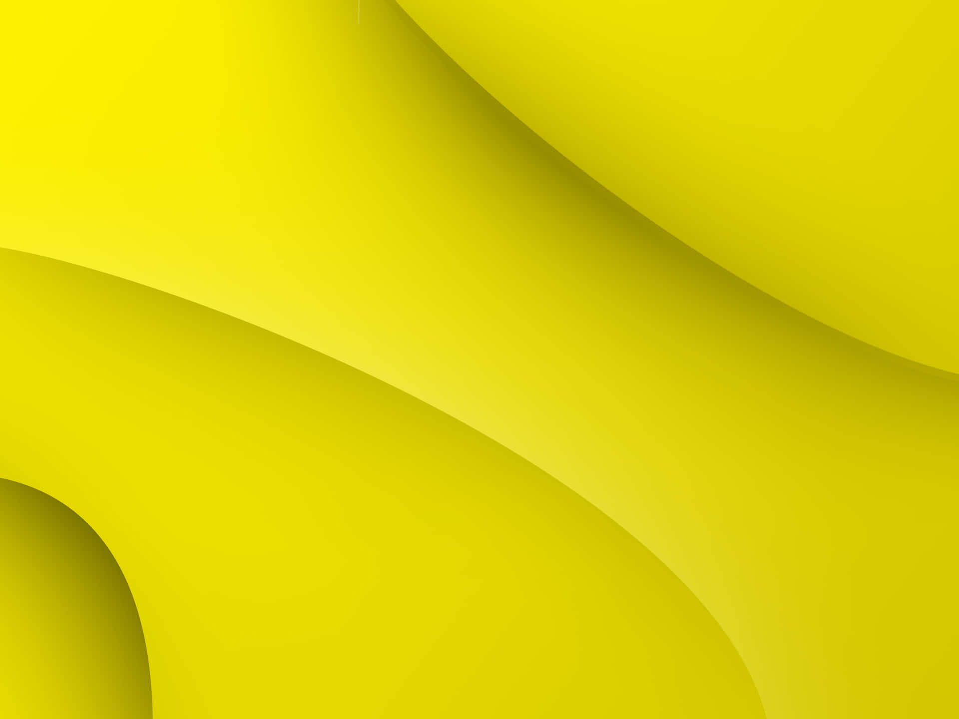 Imagemum Elegante Laptop Amarelo Pastel Em Uma Mesa De Madeira. Papel de Parede