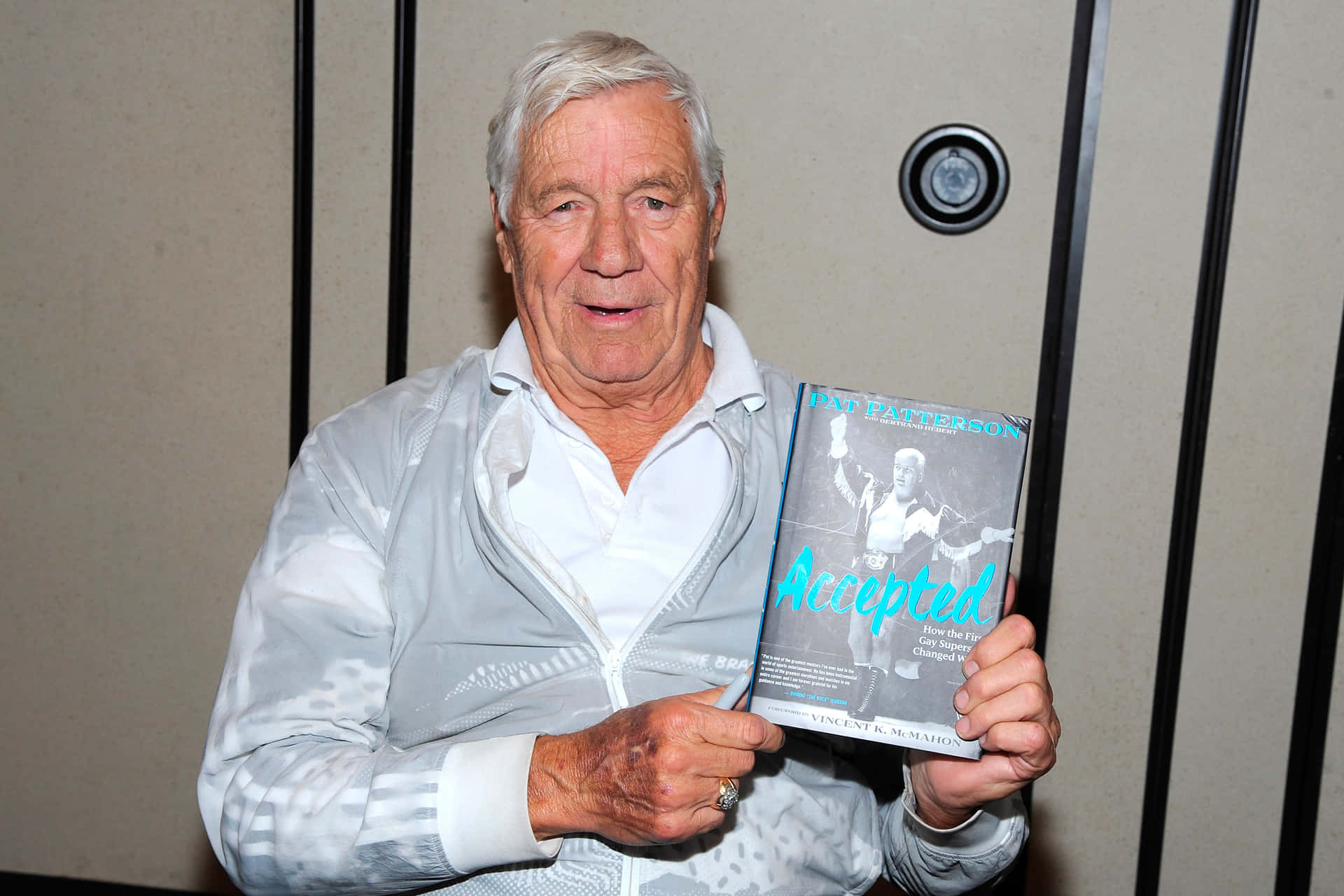 Pat Patterson Holding Accepted Book Wallpaper