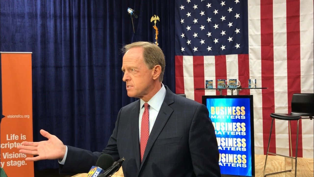 Pat Toomey At Business Event Background