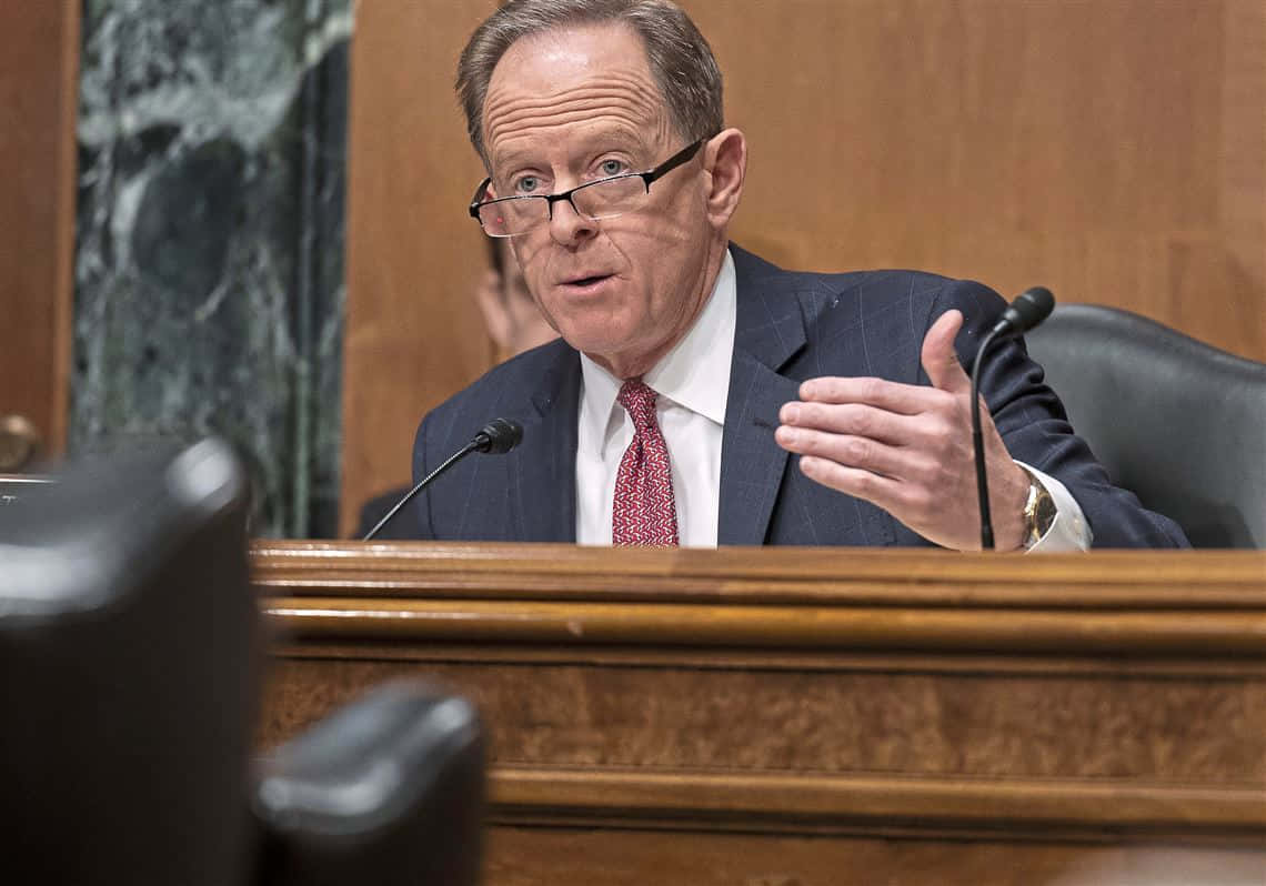 Pat Toomey passionately making a point in a committee meeting Wallpaper