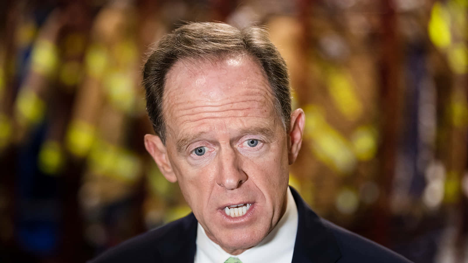 Pat Toomey Looking Down Background