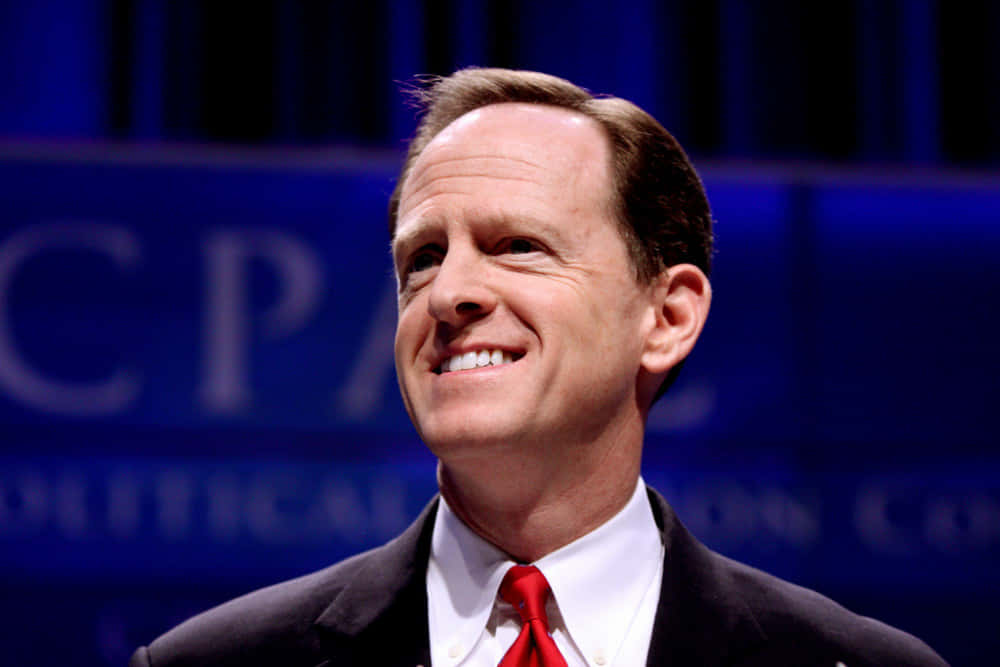 Pat Toomey Smiling At Cpac Background