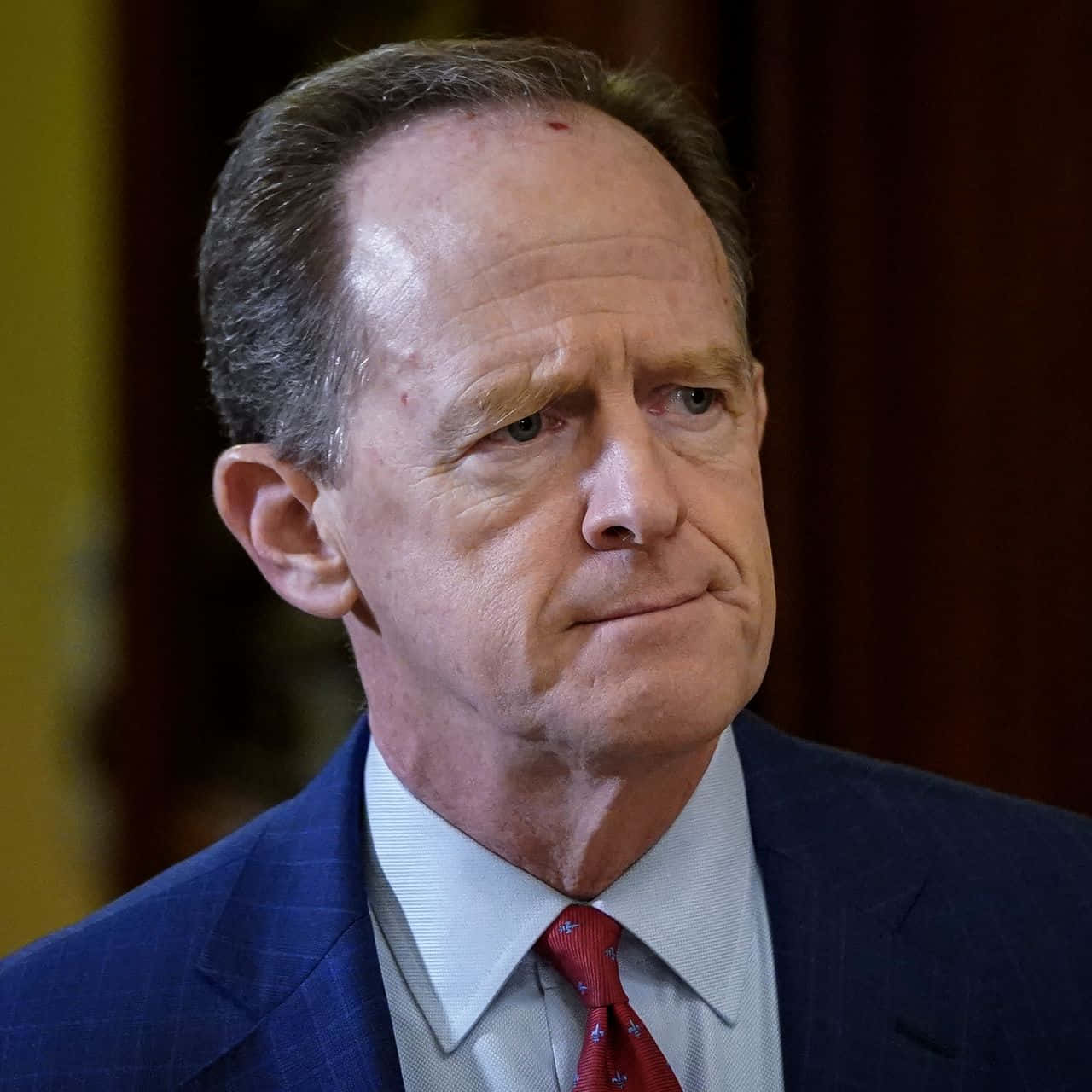 Pat Toomey With Frown Background