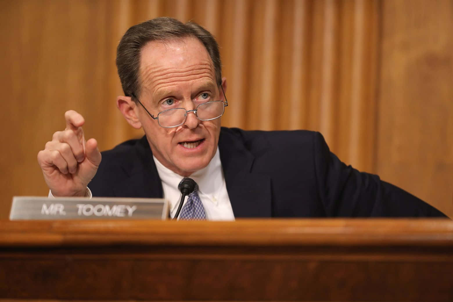 Pat Toomey With Glasses Background