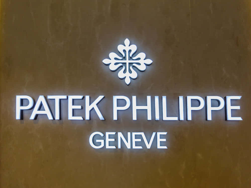 Logode Patek Philippe En La Pared. Fondo de pantalla