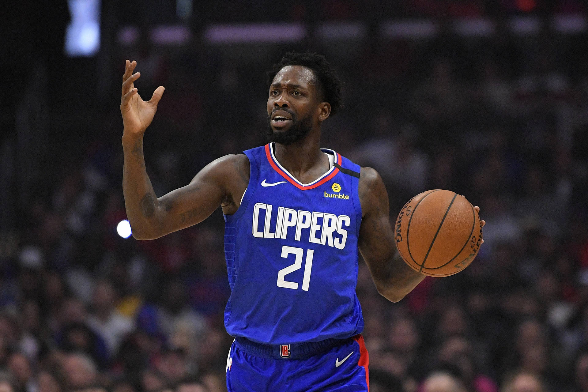 Patrick Beverly In Blue Clippers Jersey Wallpaper