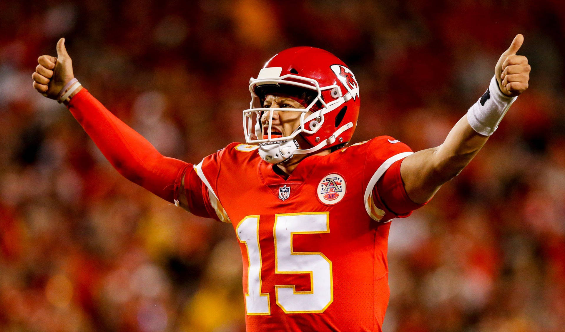 "Patrick Mahomes Celebrates Victory With a Thumbs Up". Wallpaper