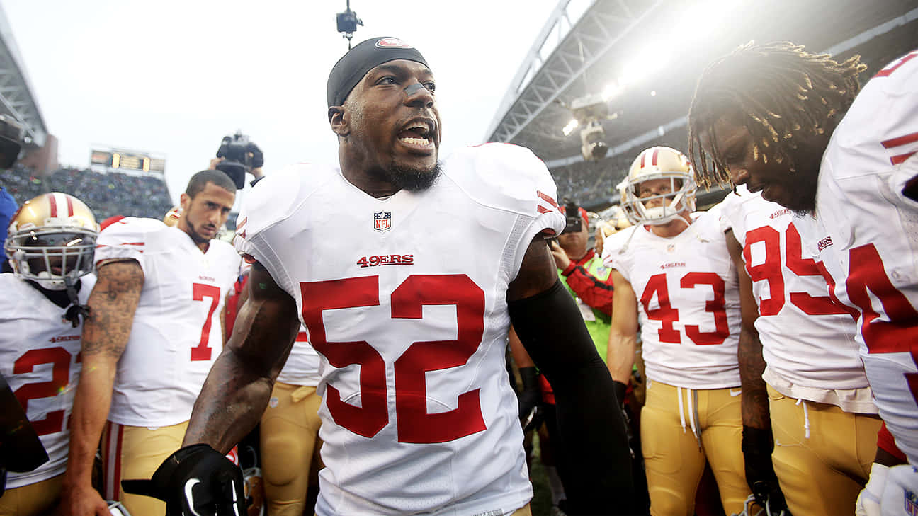 Patrick Willis Leading49ers On Field Wallpaper