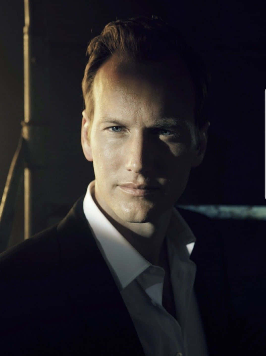 Distinguished actor Patrick Wilson looking thoughtful in a casual outfit. Wallpaper