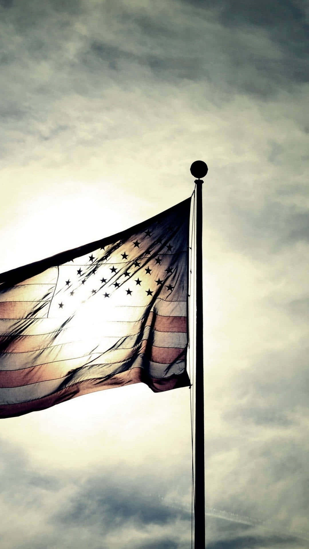 Patriotic_ Flag_ Backlit_ Sky Wallpaper