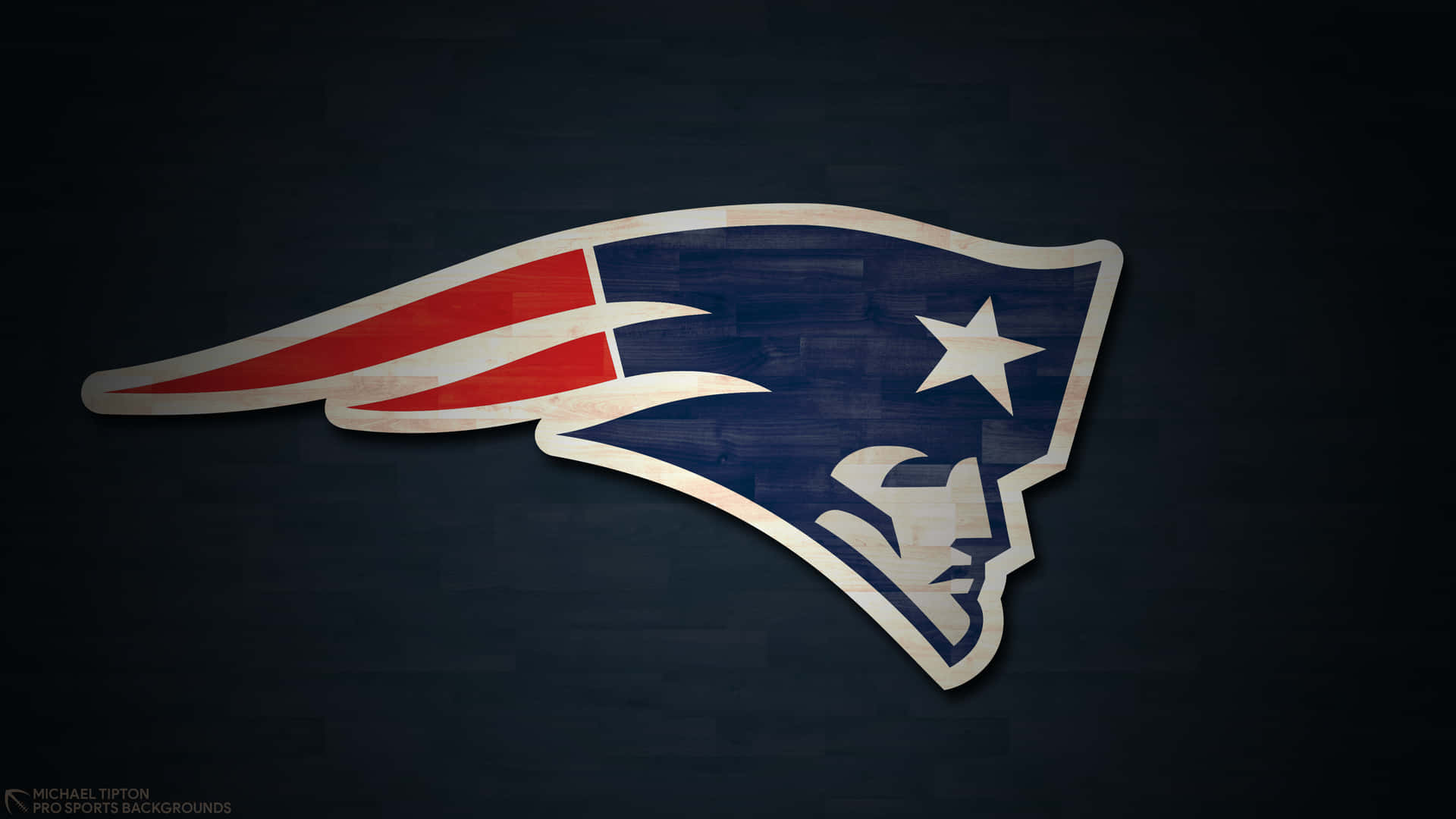 Tombrady De Los New England Patriots Liderando A Su Equipo Desde El Escritorio. Fondo de pantalla