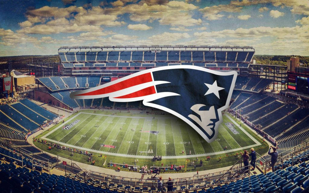 Patriots Logo On A Stadium Background Wallpaper