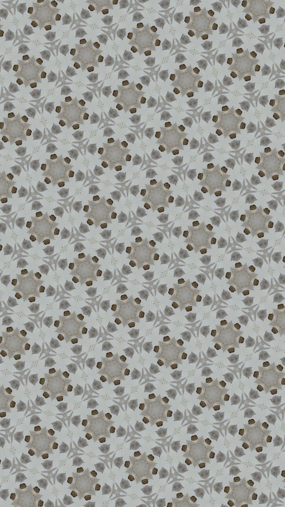 A Gray And Brown Pattern With A Flower