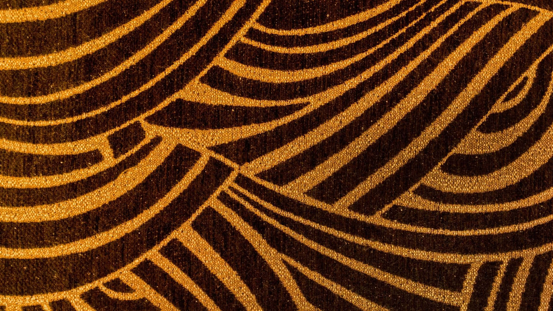 a brown and gold striped pattern on a wall