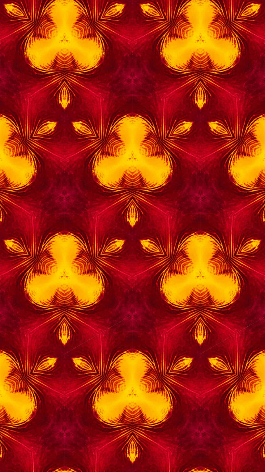 a red and yellow pattern with a flower