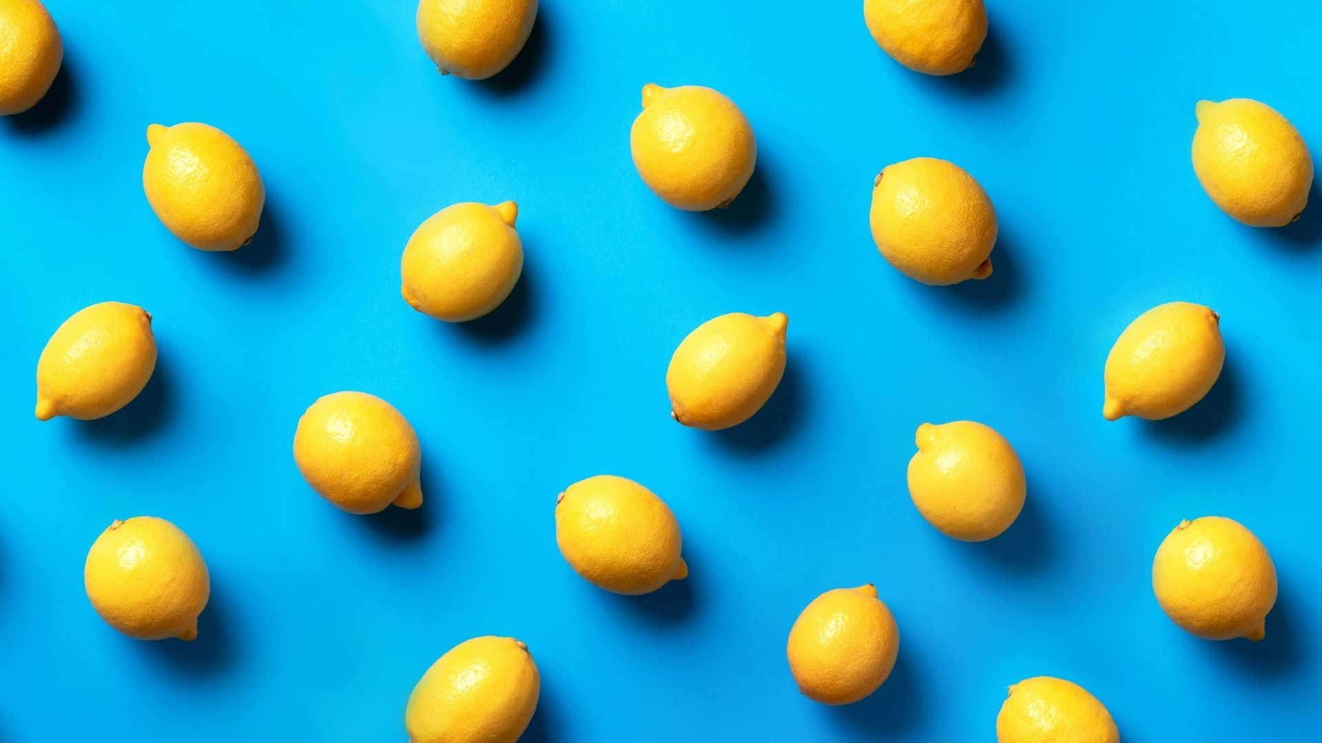 Einegruppe Von Zitronen Auf Einem Blauen Hintergrund