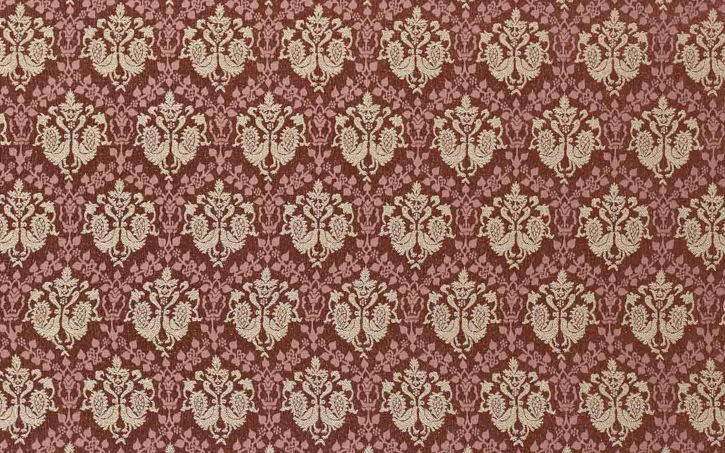 A Red And White Fabric With A Floral Pattern Wallpaper