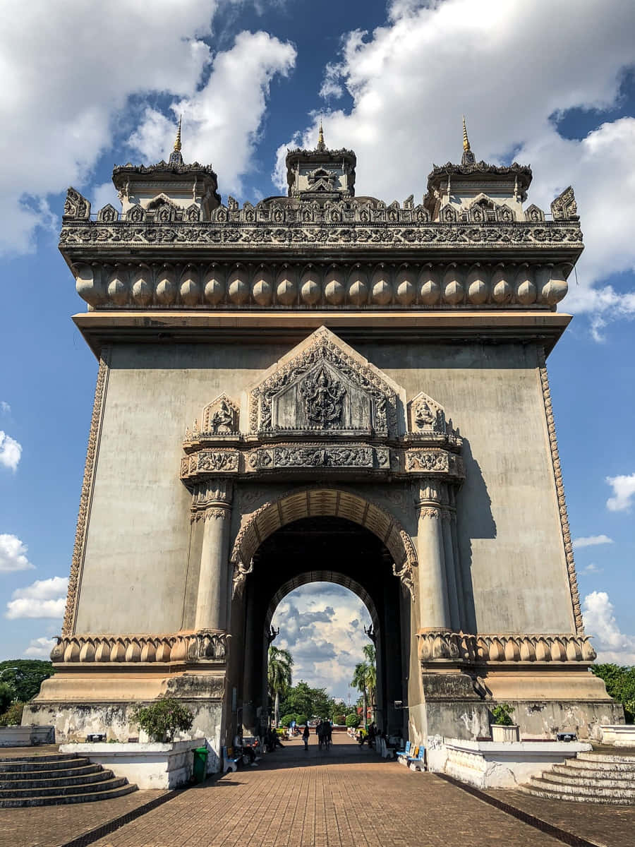 Patuxai Monument With Cloudy Sky Wallpaper