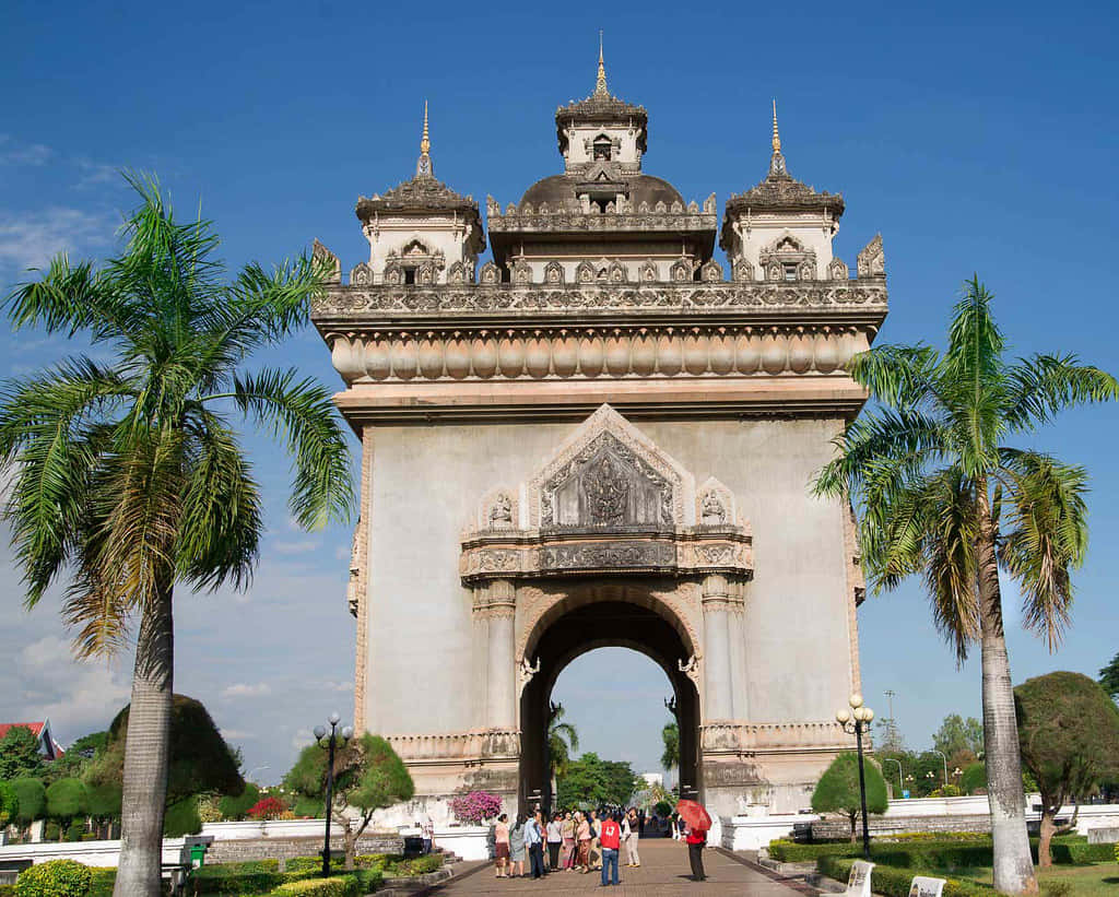 Patuxai War Monument With People Wallpaper