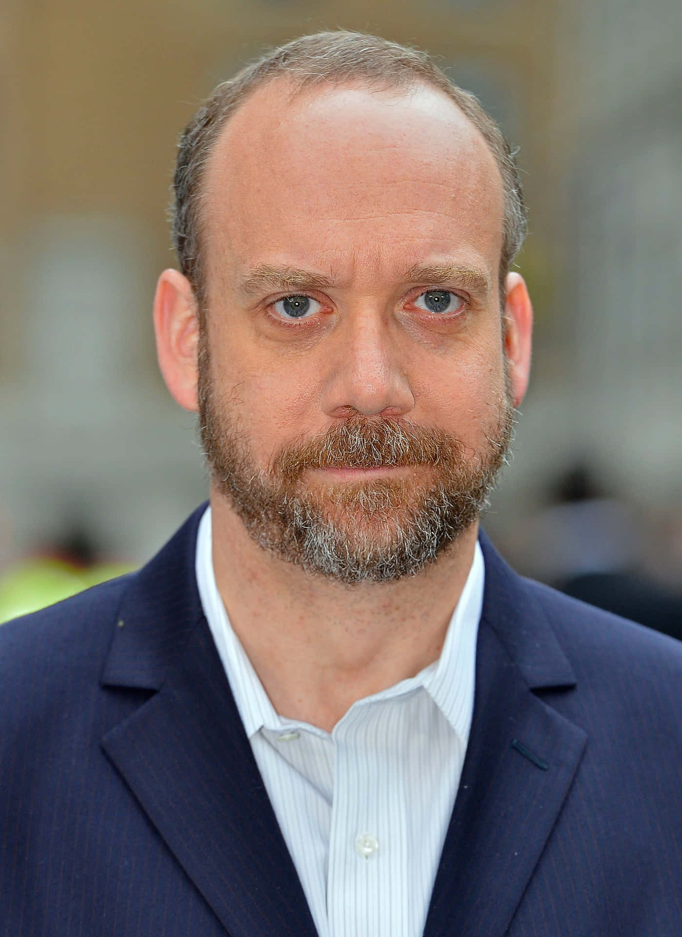Accomplished Actor Paul Giamatti In Thoughtful Moment Wallpaper