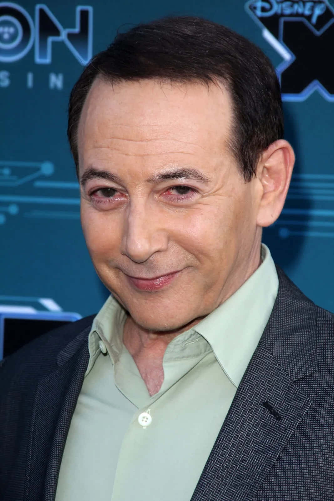 Hollywood icon Paul Reubens in the classic role of Pee-Wee Herman. Wallpaper