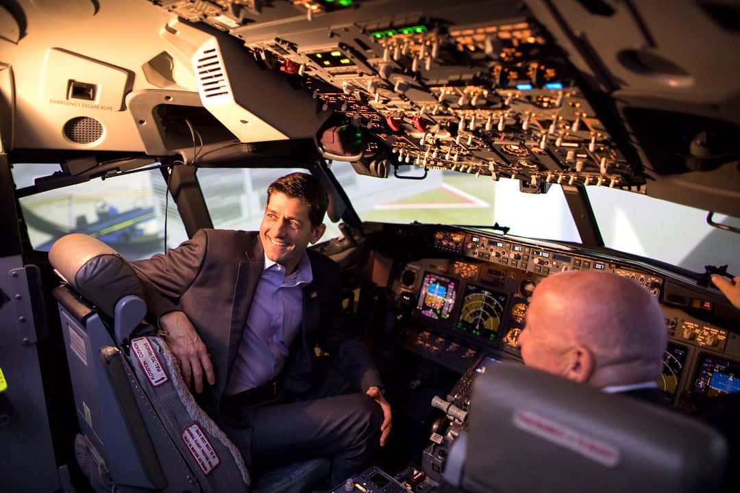 Paul Ryan In Airplane Pilot Seat Wallpaper