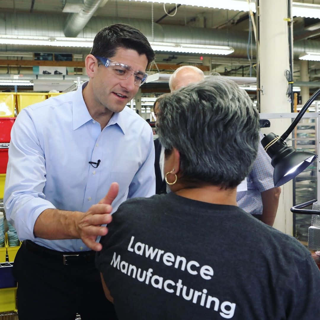 Paul Ryan In Lawrence Manufacturing Warehouse Wallpaper