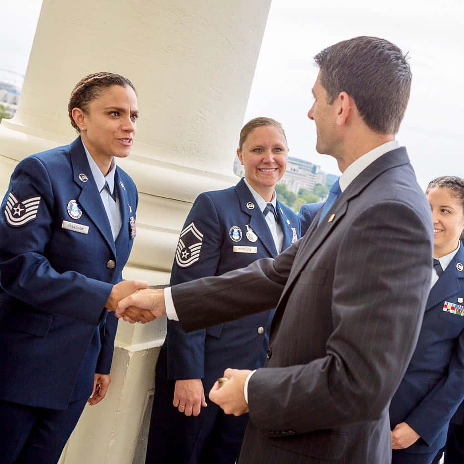 Paul Ryan With Lady Officer Wallpaper