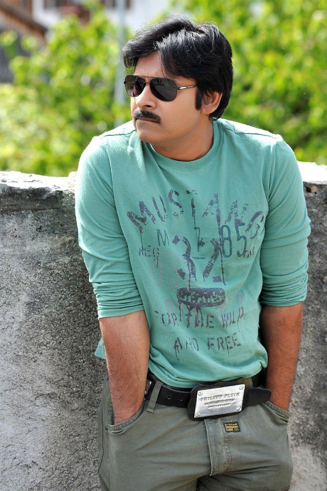 South Indian Superstar Pawan Kalyan decked out in a stylish green outfit Wallpaper