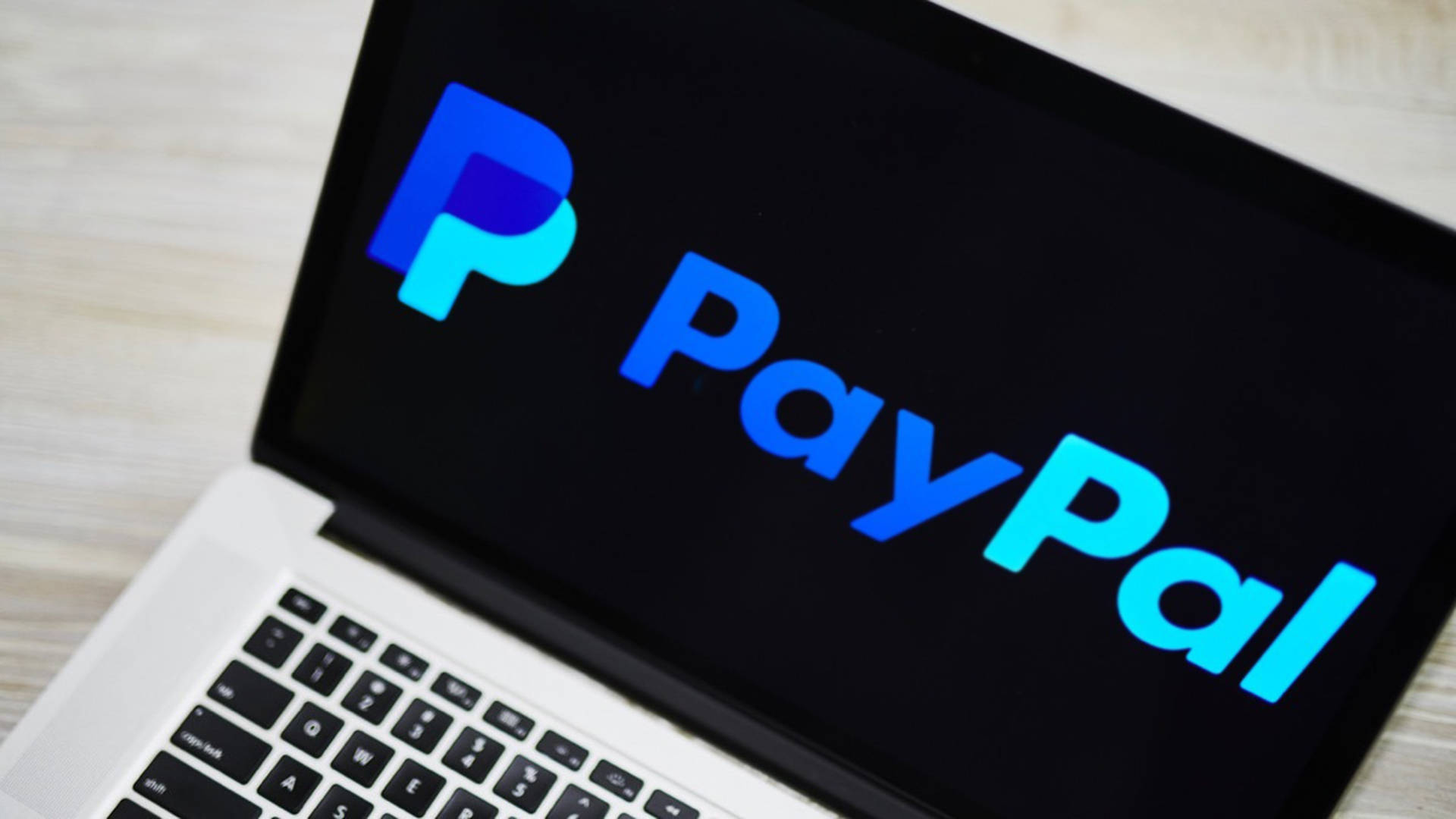 Paypal-logo Og Bærbar Skærm Wallpaper